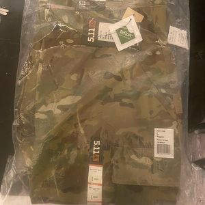 Multicam camo jeans. Two pair size large. One new one worn once and washed